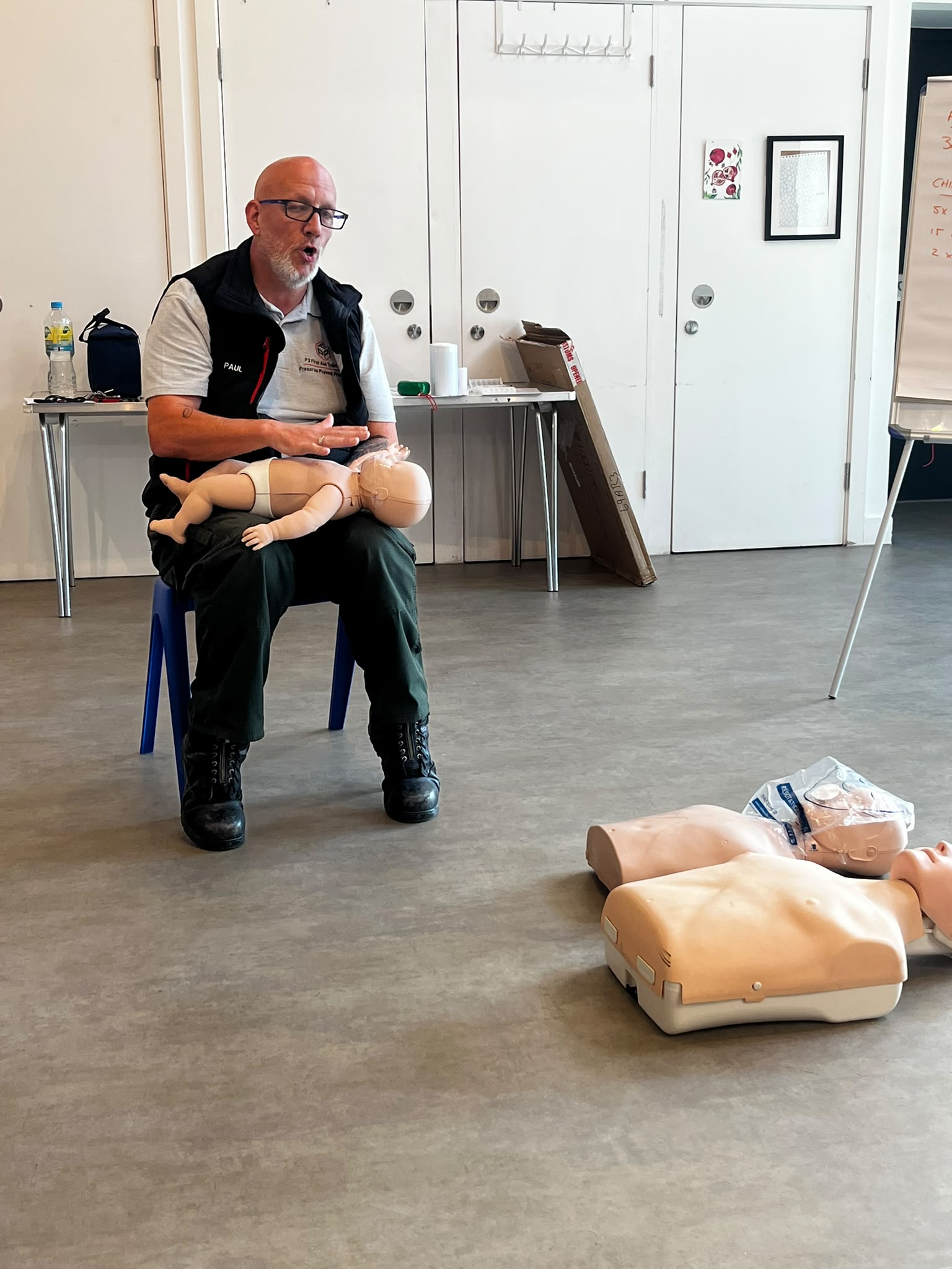 P3 First Aid Training instructor demonstrating infant first aid techniques during a paediatric first aid course
